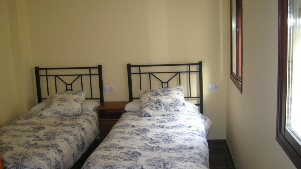 Quarto Twin com Casa de Banho Partilhada